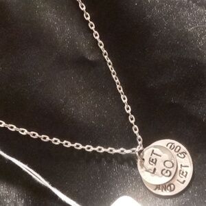 Religion 35 cent let go and let God on stainless steel chain 18 inches long